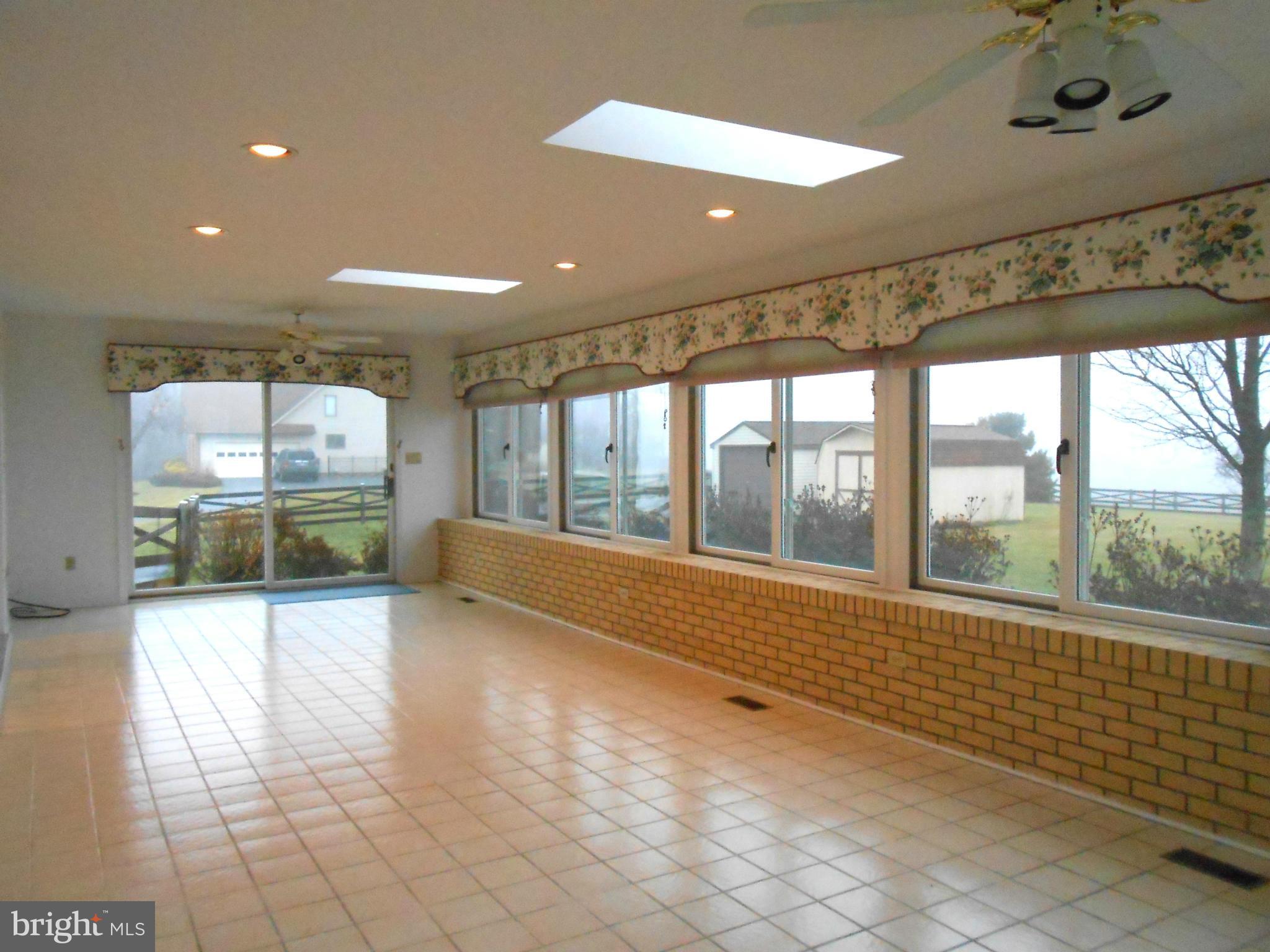 9735 Clemsonville Road Union Bridge, MD 21791 - Photo 14 of 28 Sun room