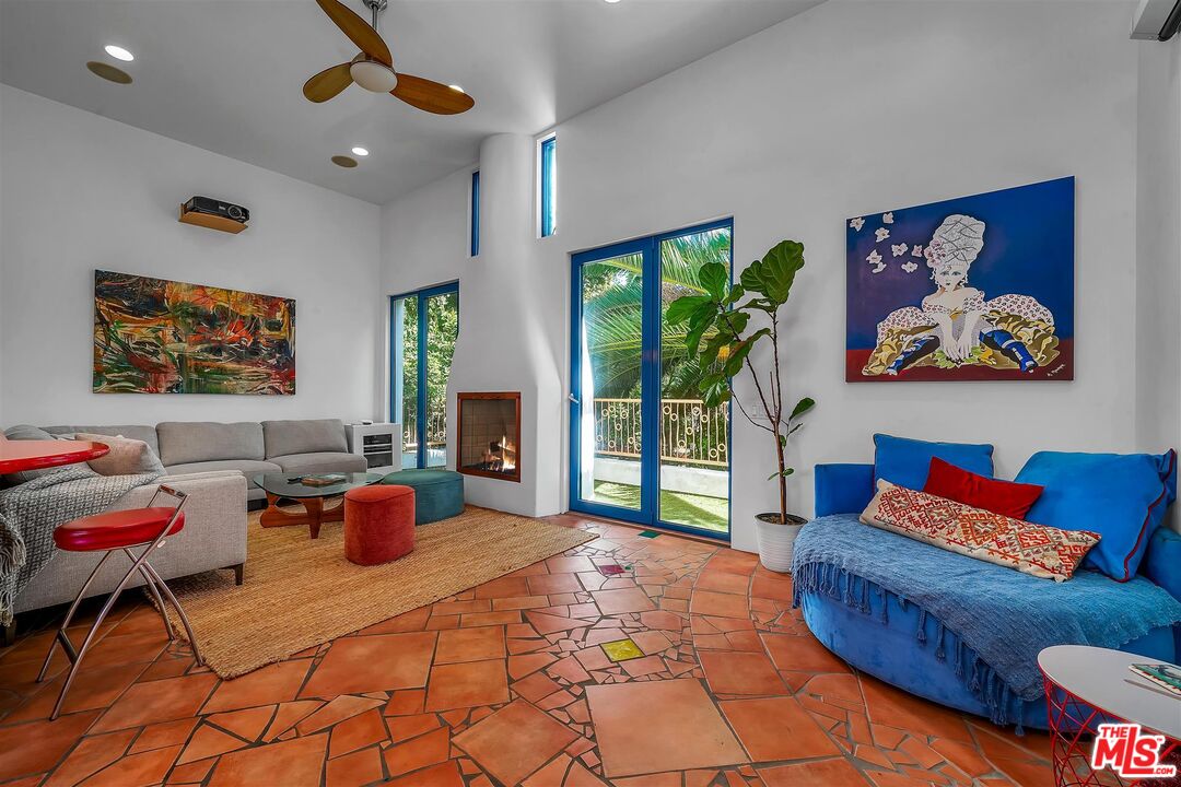 2419 Ocean Avenue Venice, CA 90291 - Photo 1 of 41 a living room with furniture and a large window