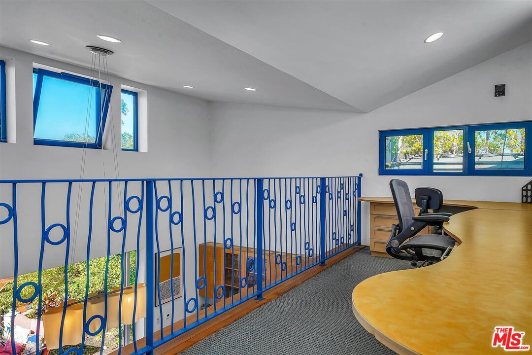 2419 Ocean Avenue Venice, CA 90291 - Photo 12 of 41 a bed room with furniture and a window