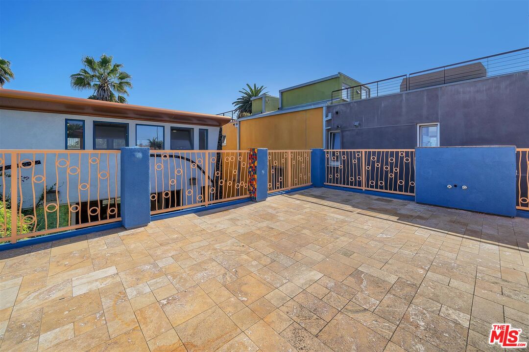 2419 Ocean Avenue Venice, CA 90291 - Photo 18 of 41 a view of a house with a wooden fence