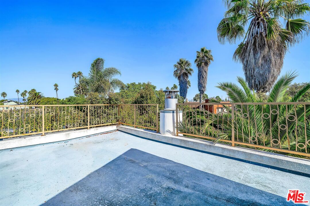 2419 Ocean Avenue Venice, CA 90291 - Photo 29 of 41 a view of a balcony with potted plants