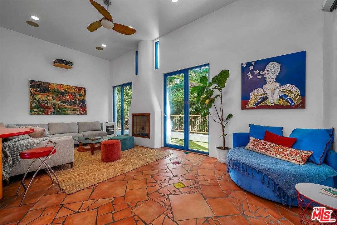 2419 Ocean Avenue Venice, CA 90291 - Photo 32 of 41 a bedroom with furniture and a large window