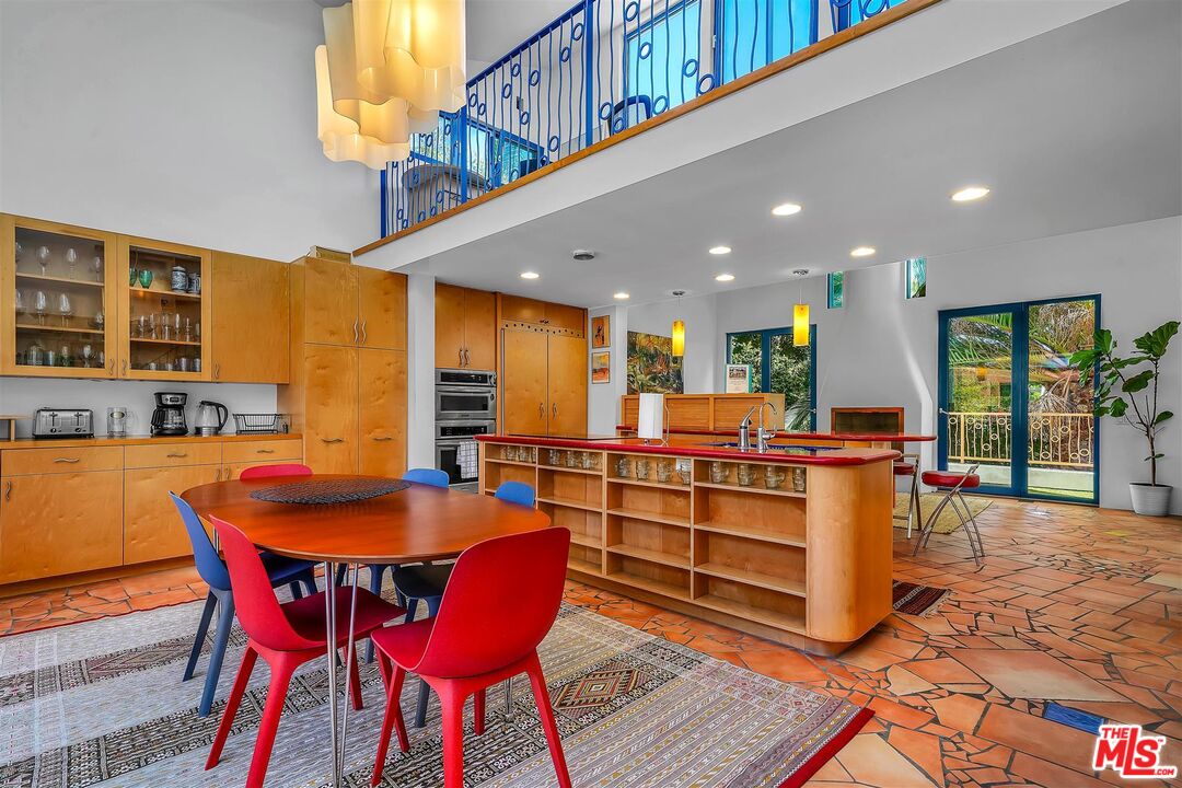 2419 Ocean Avenue Venice, CA 90291 - Photo 8 of 41 a large kitchen with a table and chairs