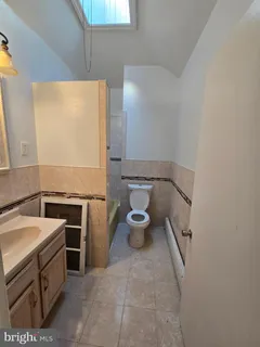 a bathroom with a sink and a toilet