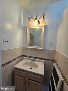 a bathroom with a tub and a shower
