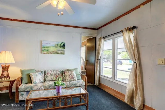 a view of a livingroom with furniture