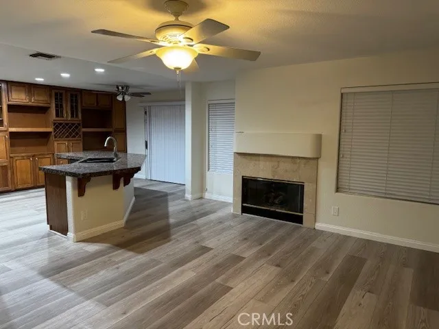 a view of a livingroom with wooden floor