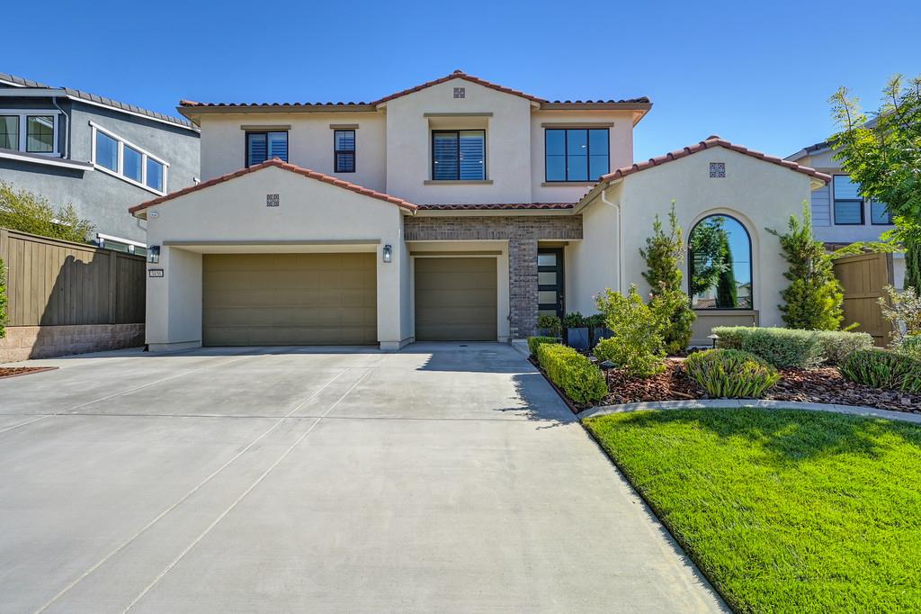3456 Hidden Ranch Loop Rocklin, CA 95765 - Photo 2 of 85 a view of a house with a yard