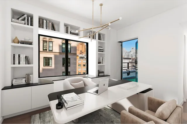 a bathroom with a tub and shower