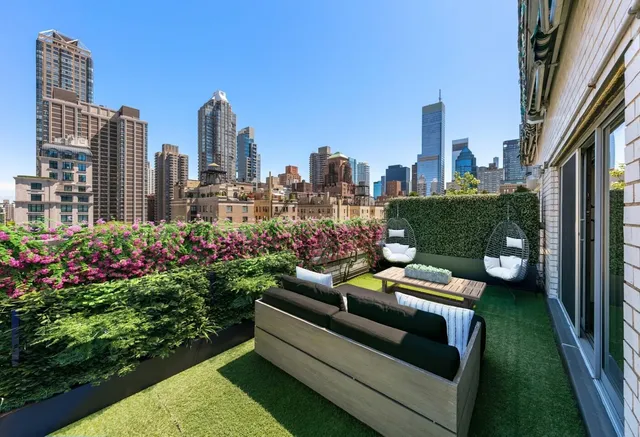 a view of a city with tall buildings