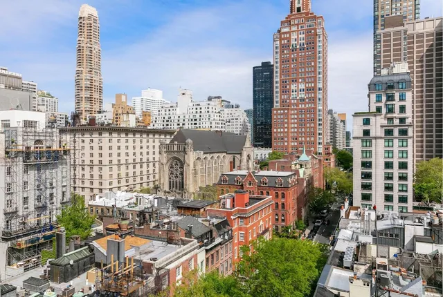 a view of a city with tall buildings