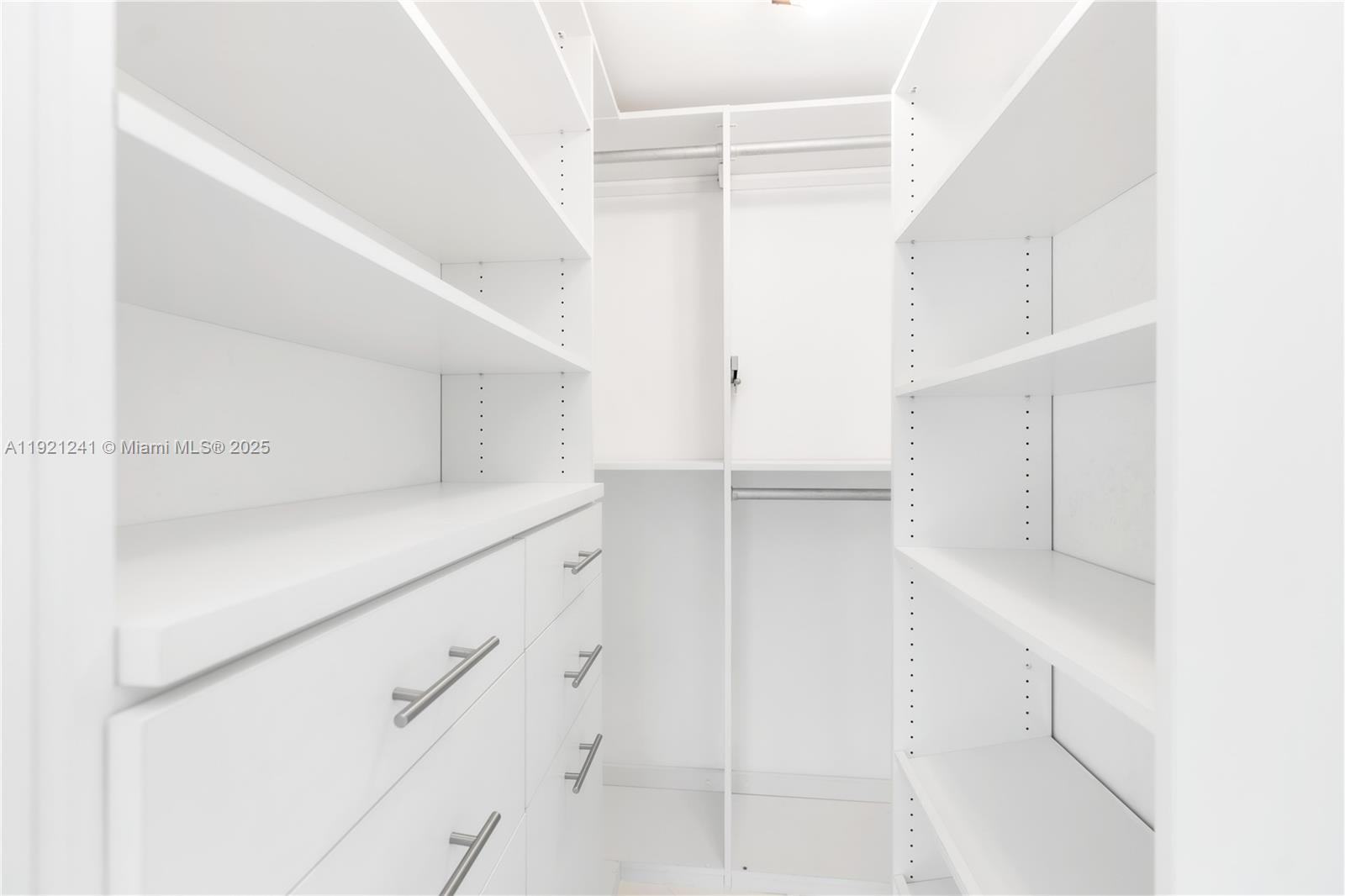 60 Southwest 13th Street, Unit 2626 Miami, FL 33130 - Photo 27 of 48 a view of walk in closet with white walls