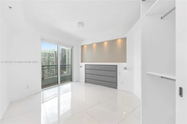 a view of an empty walk in closet