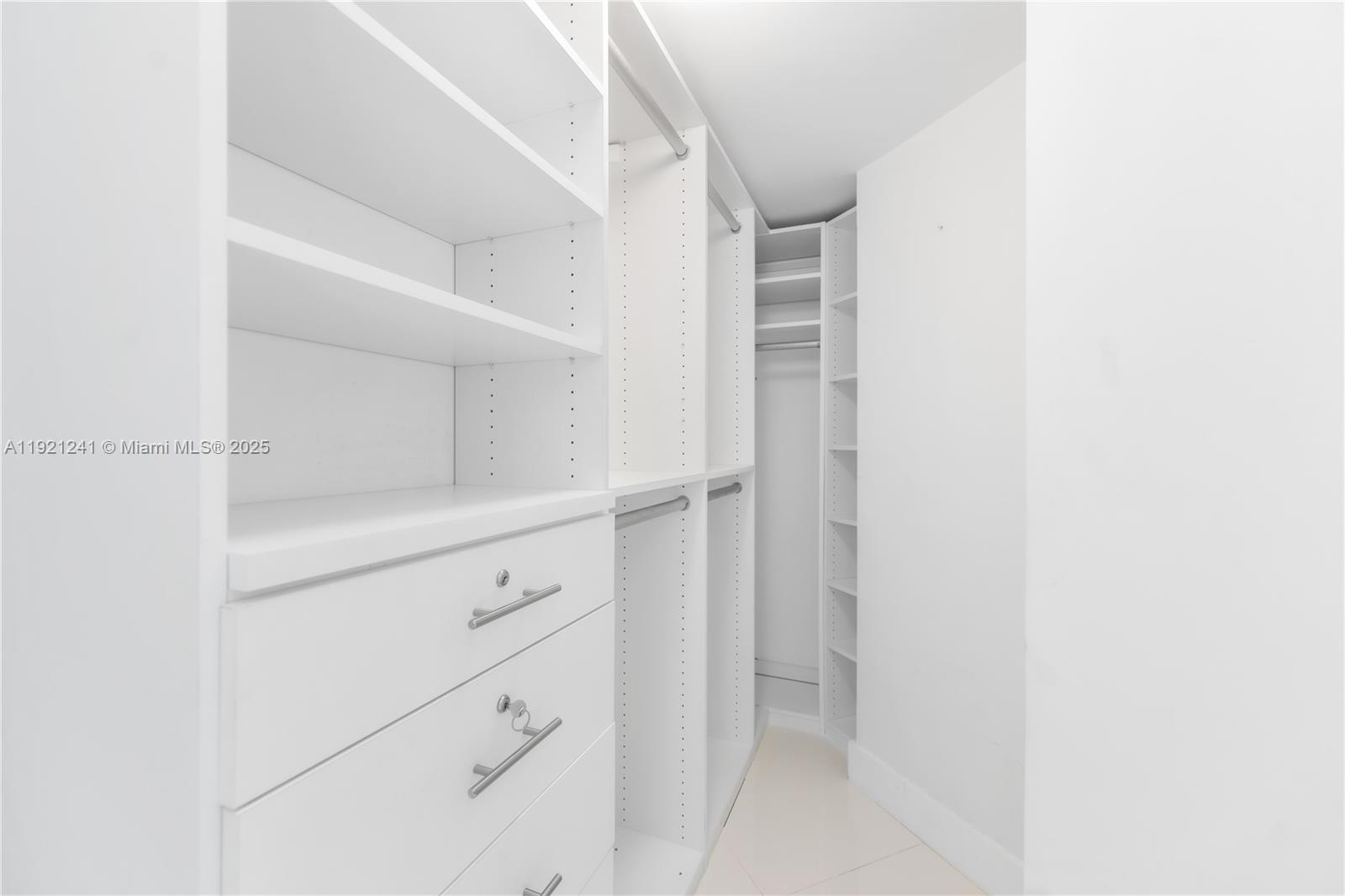 60 Southwest 13th Street, Unit 2626 Miami, FL 33130 - Photo 32 of 48 a view of an empty walk in closet