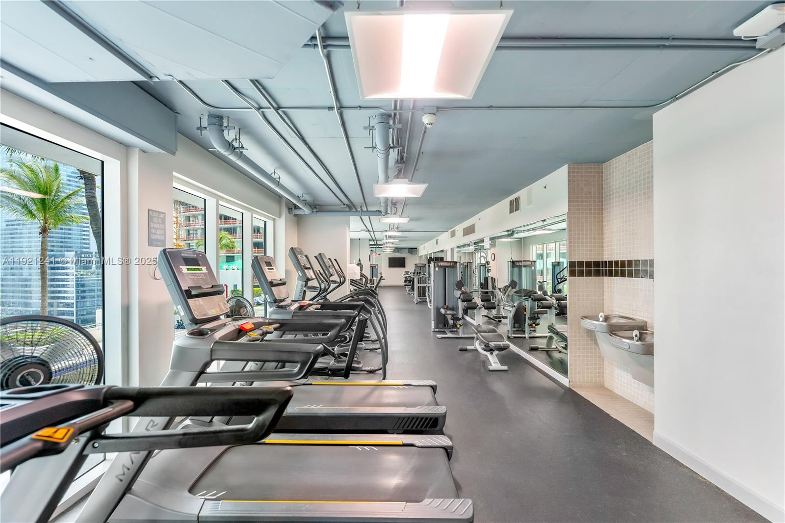 60 Southwest 13th Street, Unit 2626 Miami, FL 33130 - Photo 42 of 48 a view of a room with gym equipment