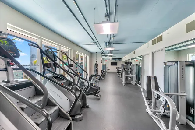 a view of a room with gym equipment