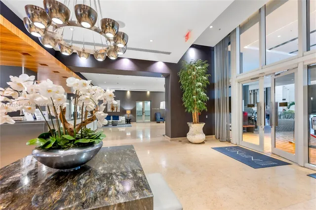 a large room with lots of table and chairs