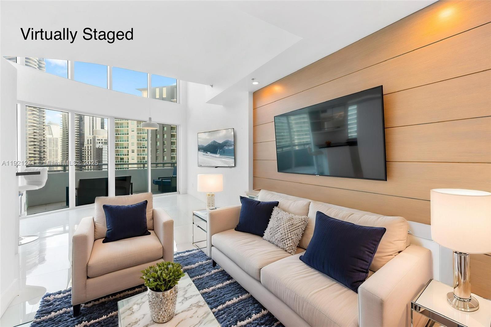 60 Southwest 13th Street, Unit 2626 Miami, FL 33130 - Photo 7 of 48 a living room with furniture and a large window