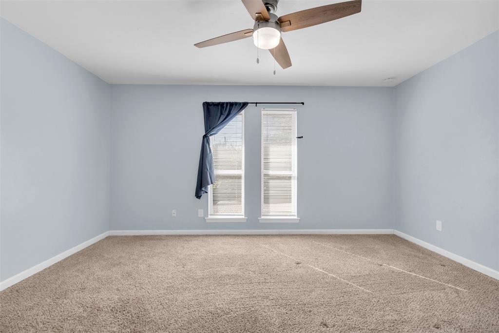 4688 Matilda Street, Unit H Dallas, TX 75206 - Photo 15 of 20 an empty room with a window