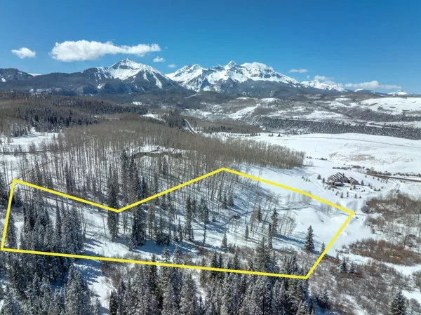 a view of a pathway with a building in the background