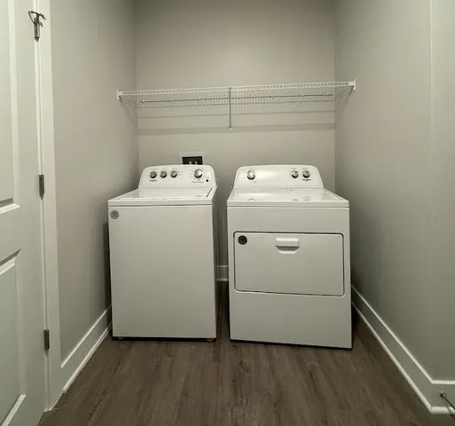 an empty room with a ceiling fan and window