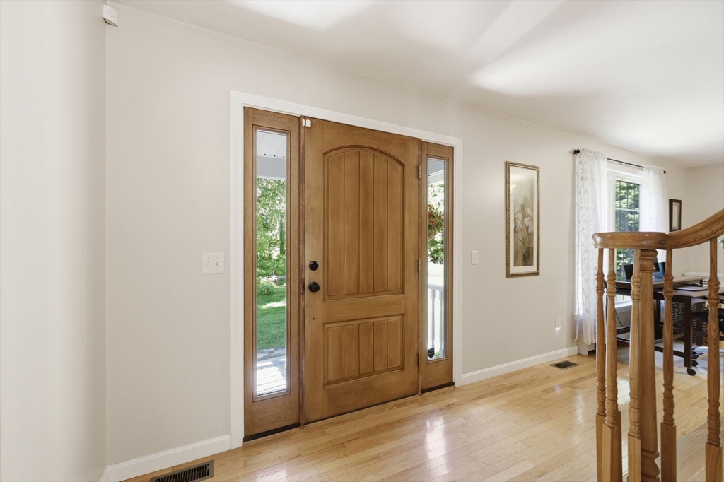 345 Bragg Road Warren, MA 01585 - Photo 5 of 41 a view of entryway with wooden floor