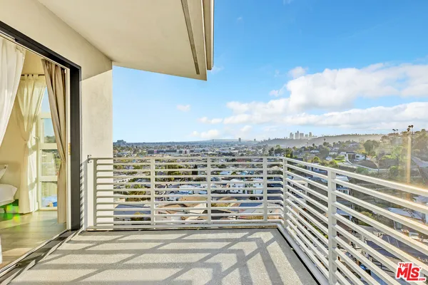 a view of balcony with city view