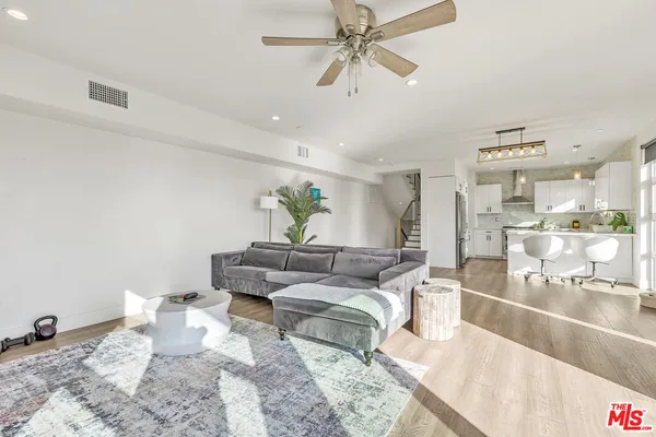 a living room with furniture and a view of living room