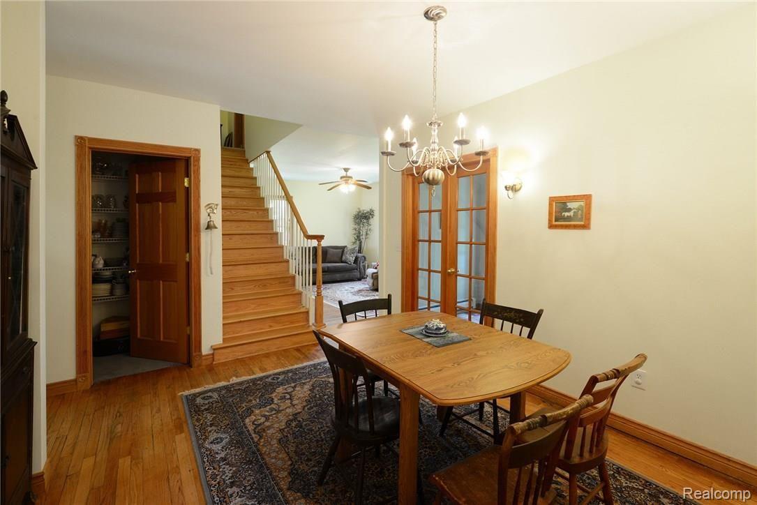 4355 North Eager Road Howell, MI 48855 - Photo 7 of 32 dining room with french doors to foyer. large pantry to the left
