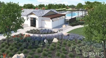 a aerial view of a house with a yard and garage