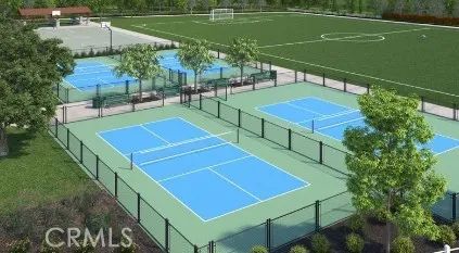 a view of a tennis court with a swimming pool
