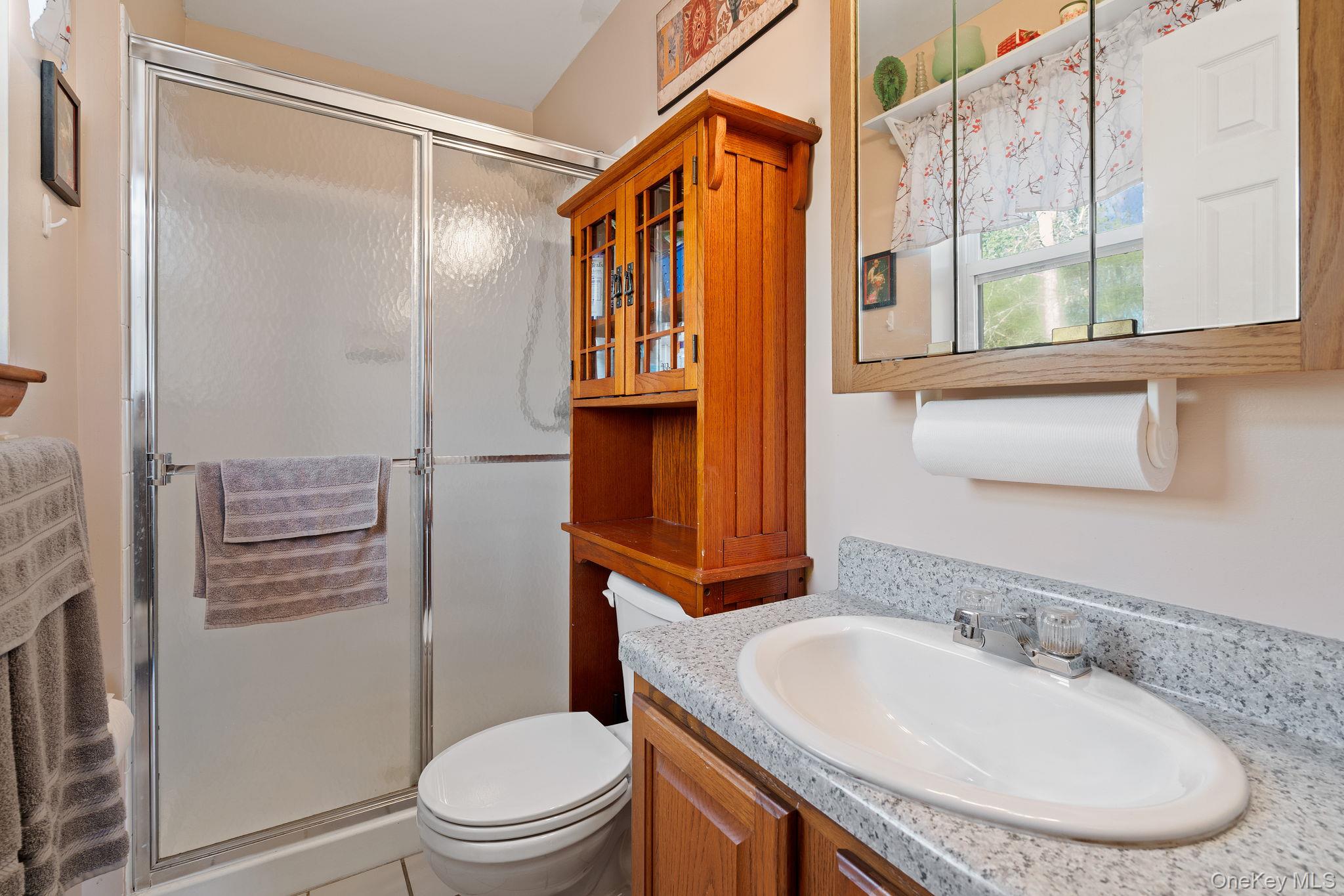 171 E Road Wallkill, NY 12589 - Photo 15 of 47 Full bathroom with a shower stall and vanity
