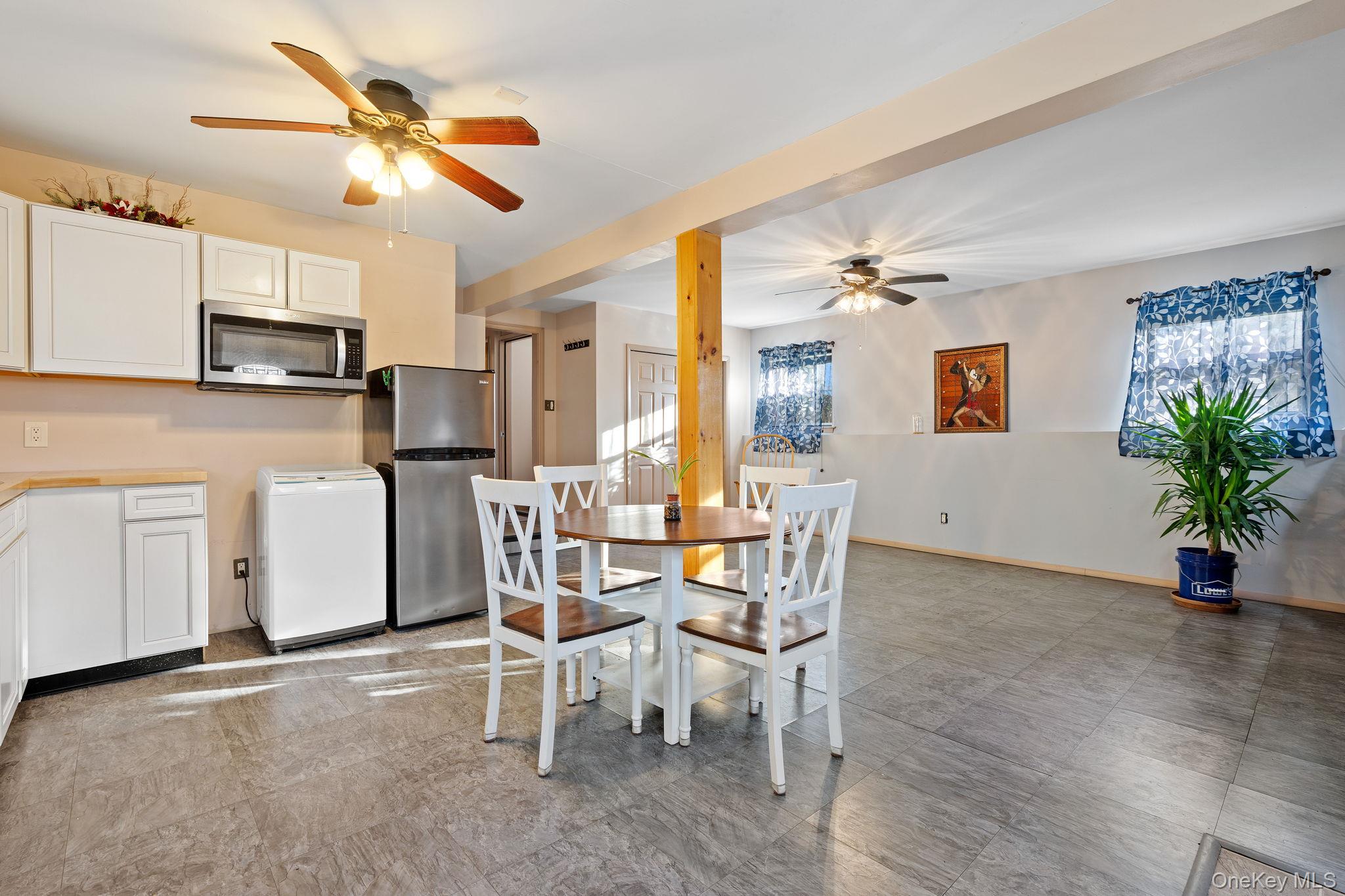 171 E Road Wallkill, NY 12589 - Photo 21 of 47 Dining area featuring ceiling fan and plenty of natural light