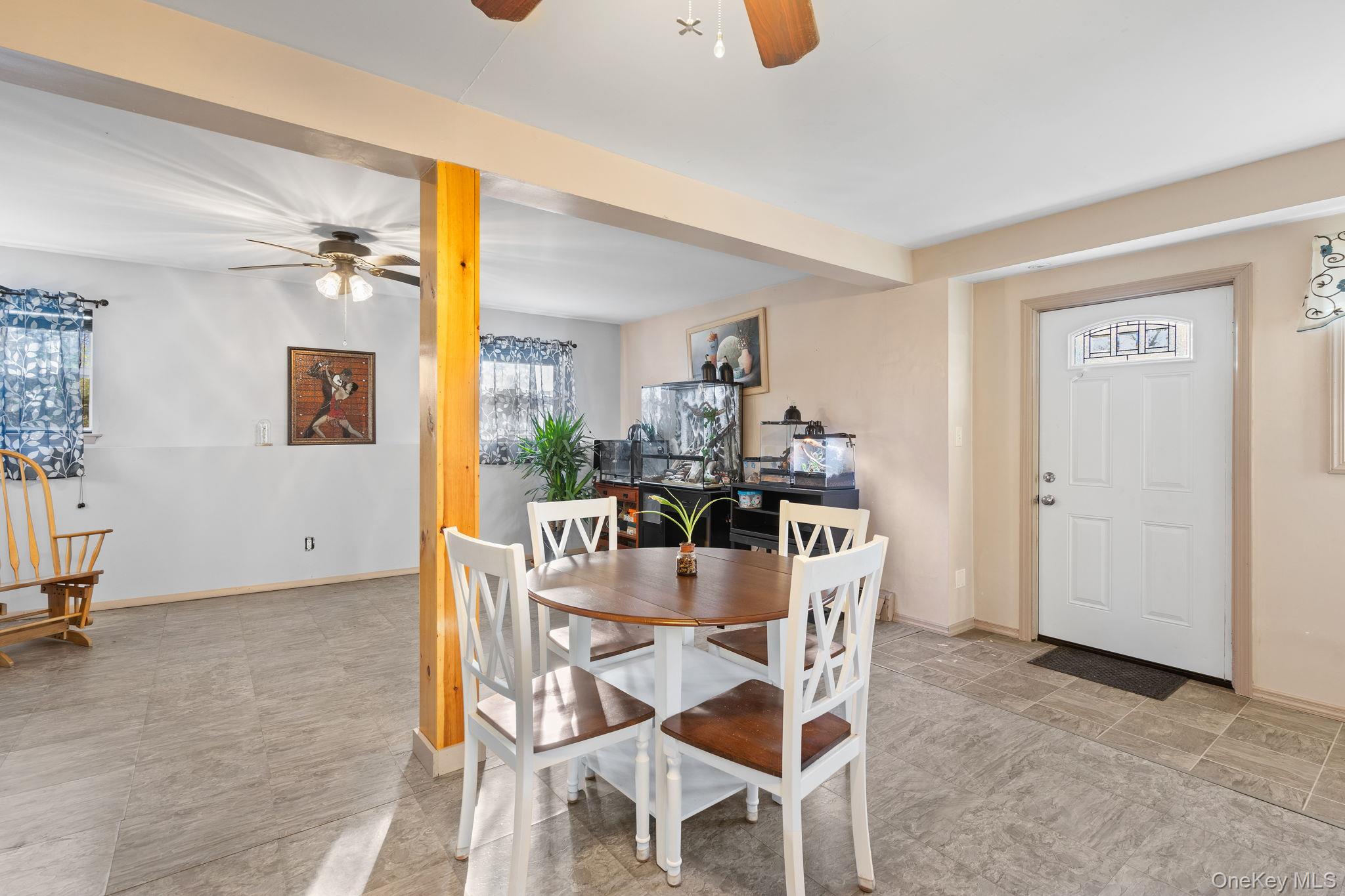 171 E Road Wallkill, NY 12589 - Photo 23 of 47 Dining space with a ceiling fan and baseboards