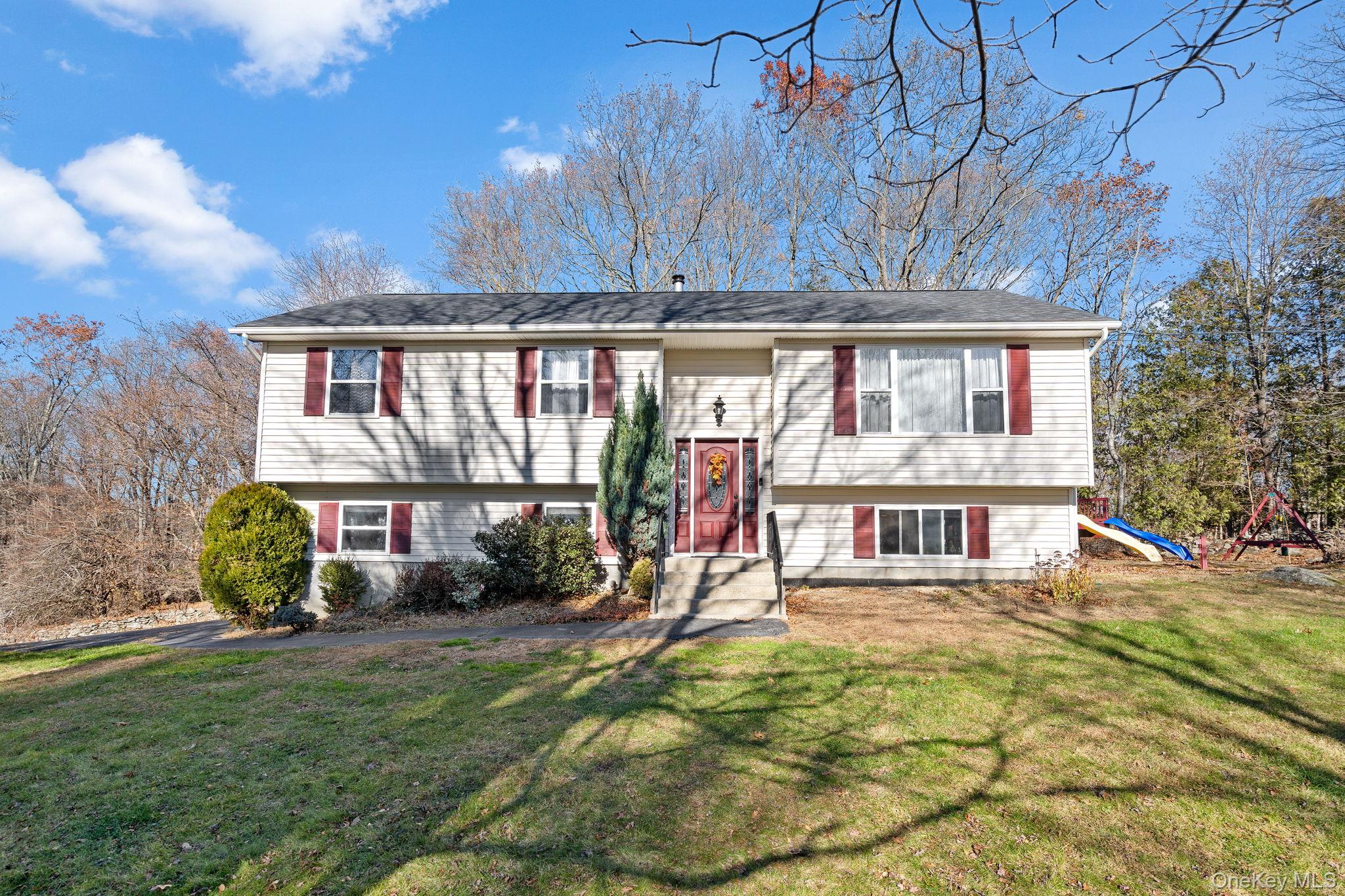 171 E Road Wallkill, NY 12589 - Photo 36 of 47 Split foyer home with a front yard