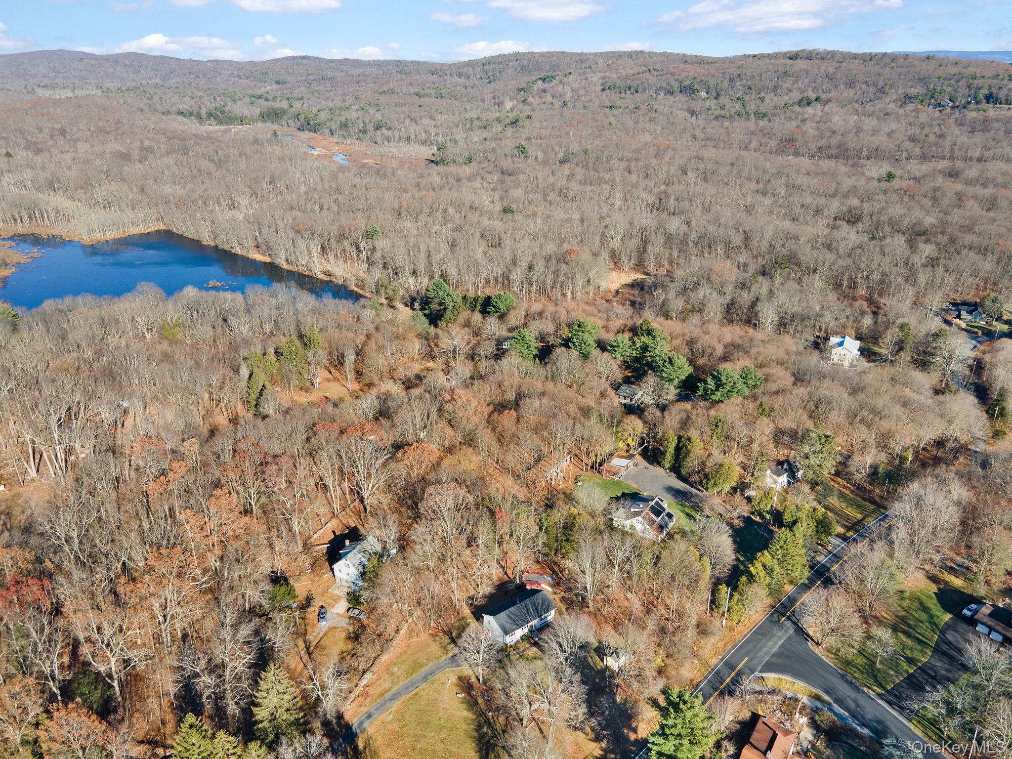 171 E Road Wallkill, NY 12589 - Photo 43 of 47 Aerial view of property's location featuring a forest and a nearby body of water
