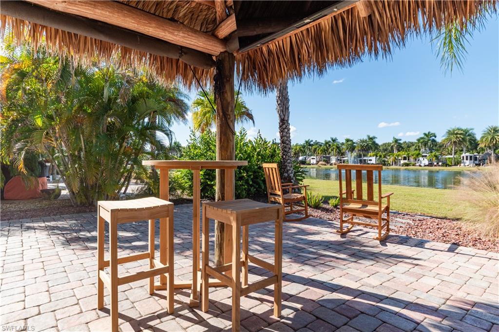 5216 Pineland Daisy Trail Fort Myers, FL 33905 - Photo 12 of 16 View of patio featuring a water view
