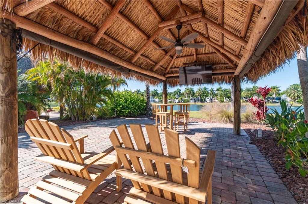 5216 Pineland Daisy Trail Fort Myers, FL 33905 - Photo 5 of 16 View of patio with a ceiling fan and a water view