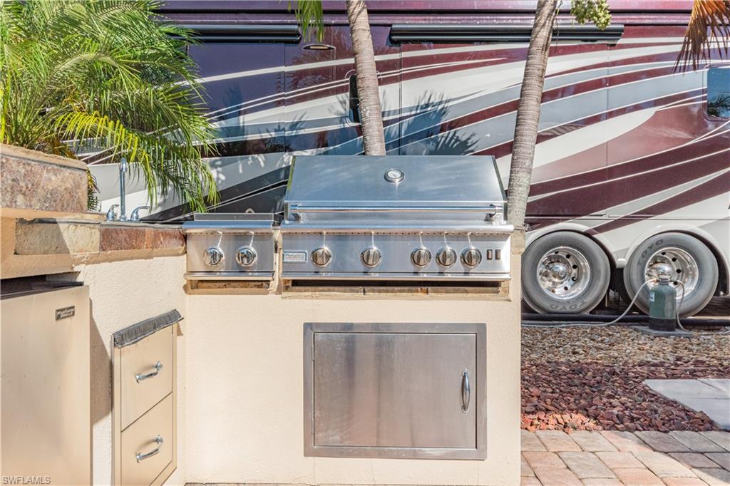5216 Pineland Daisy Trail Fort Myers, FL 33905 - Photo 9 of 16 View of patio with exterior kitchen