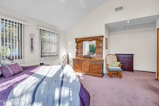 a room with furniture and a large window