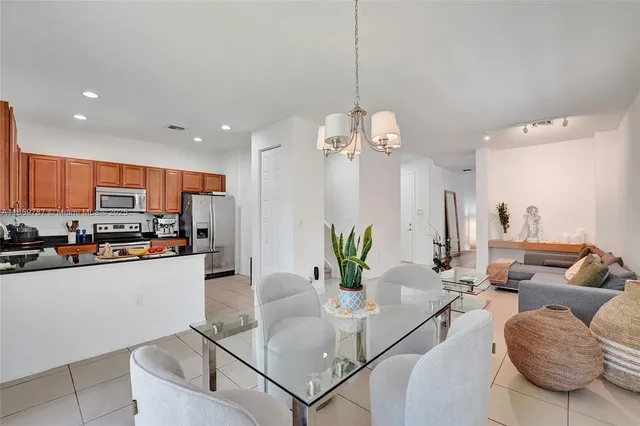 a bedroom with a bed and a night stand