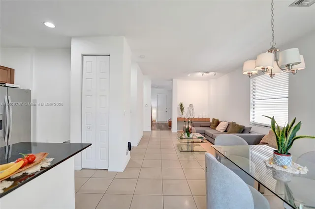 a bathroom with a shower and a sink