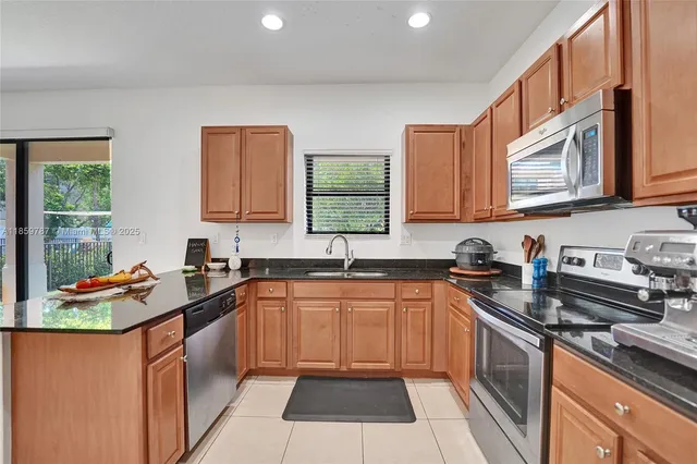 a bathroom with a toilet and a bathtub