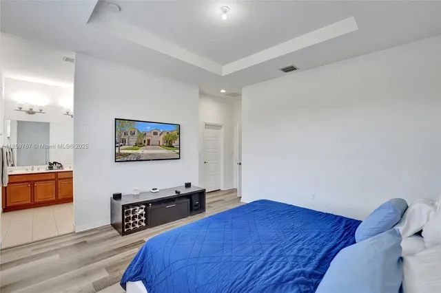 an aerial view of a house with a garden