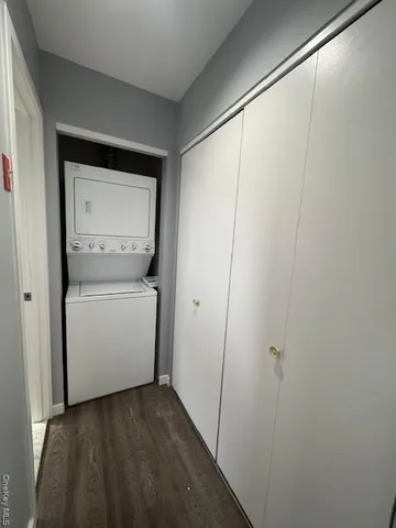 a view of storage and utility room with washer and dryer