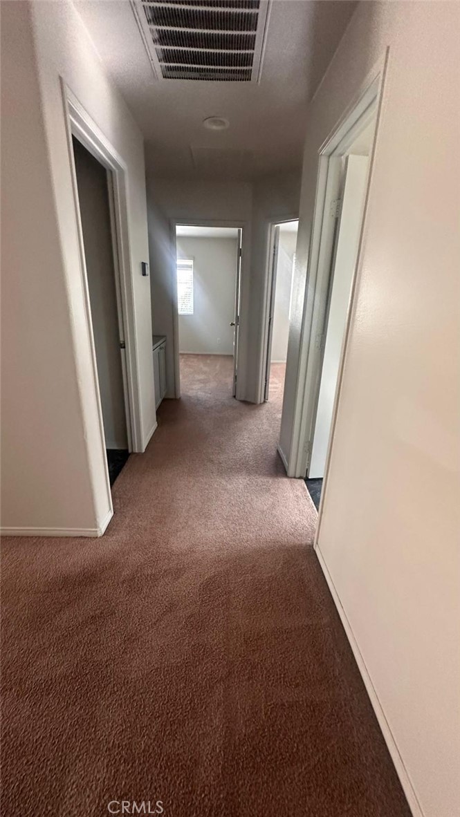 3888 Strand Way Perris, CA 92571 - Photo 3 of 7 a view of a livingroom with an empty space