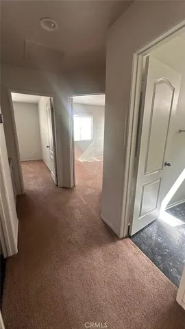 a view of a livingroom with wooden floor