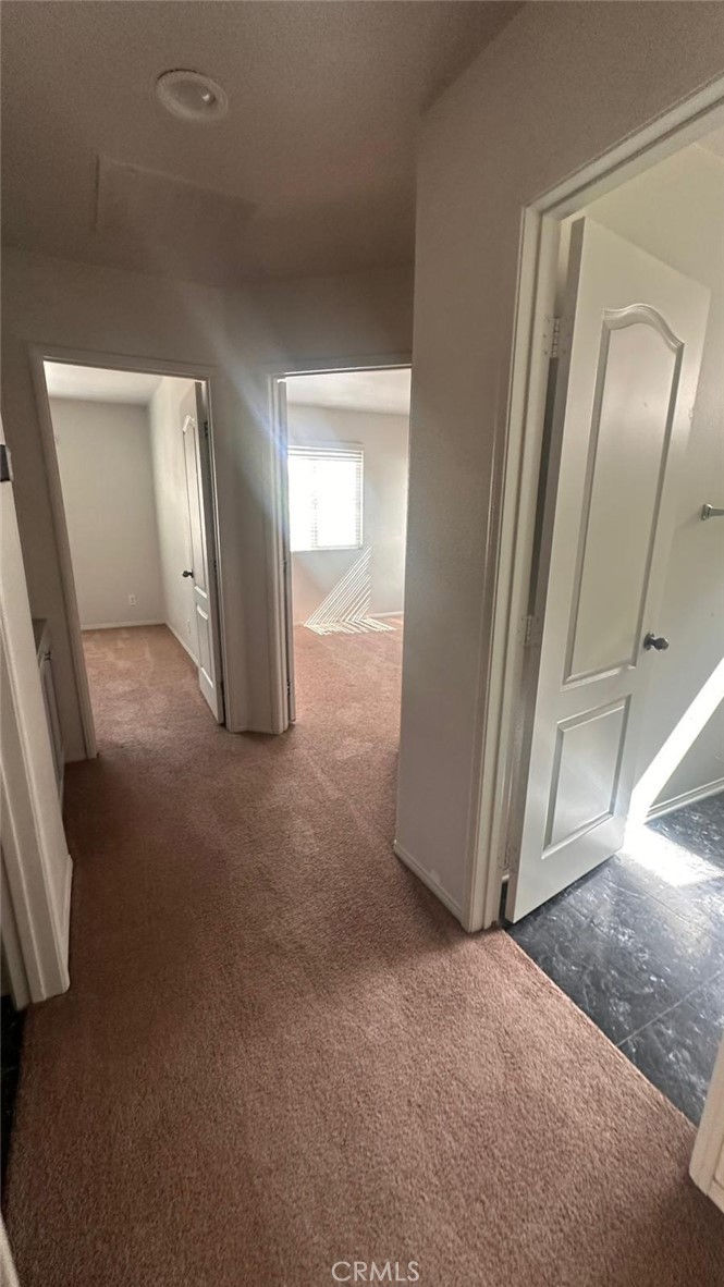 3888 Strand Way Perris, CA 92571 - Photo 4 of 7 a view of a livingroom with wooden floor