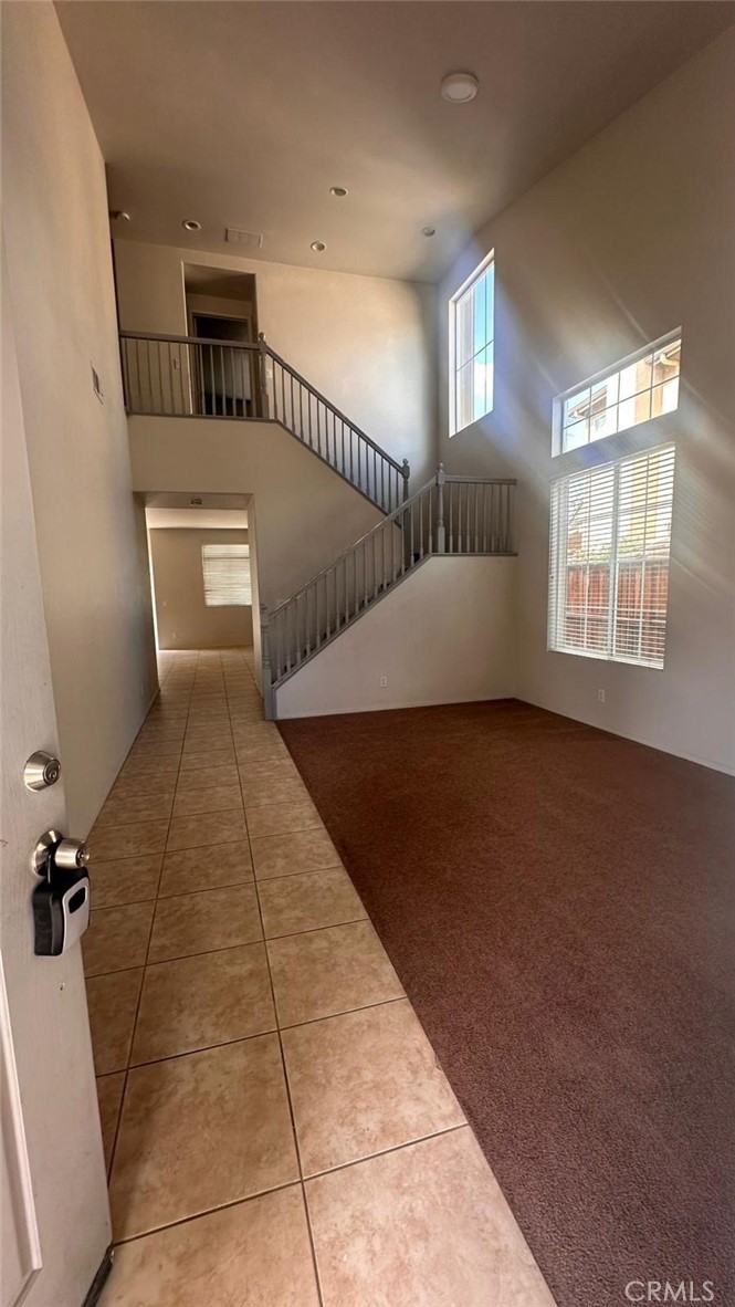 3888 Strand Way Perris, CA 92571 - Photo 6 of 7 a view of an empty room with a window