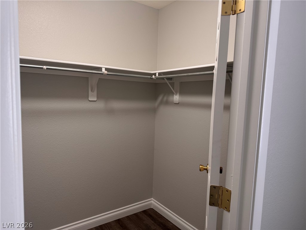 8937 Austin Ridge Avenue Las Vegas, NV 89178 - Photo 7 of 22 Ample storage solutions define this practical and organized closet space.